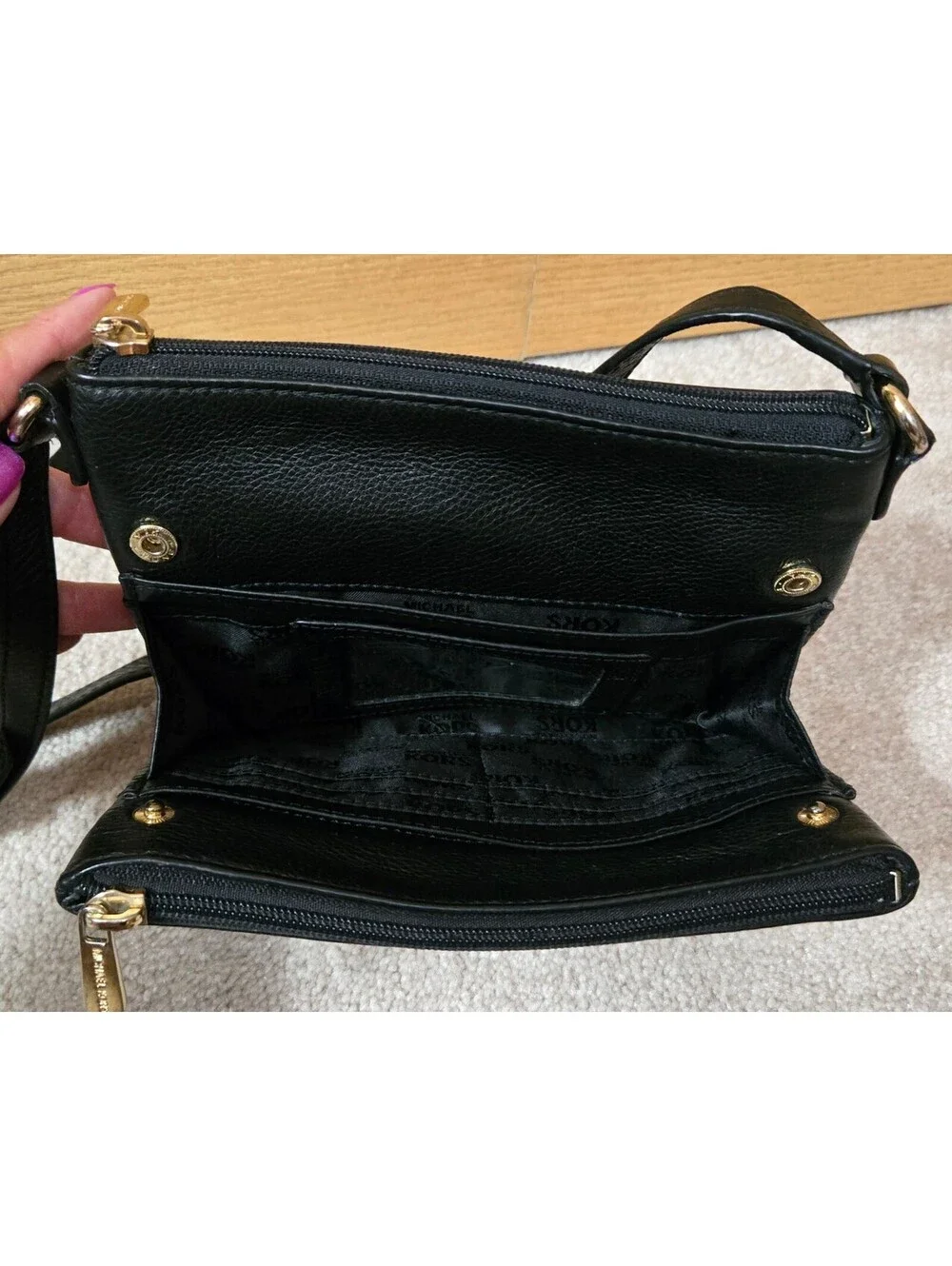 Michael Kors Black Leather Crossbody Bag with Gold Logo and Adjustable Strap